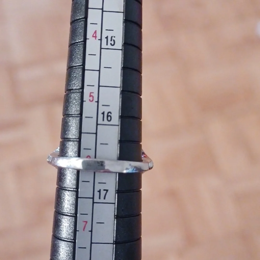 Silver ring marked s925 size 6 purple  stone